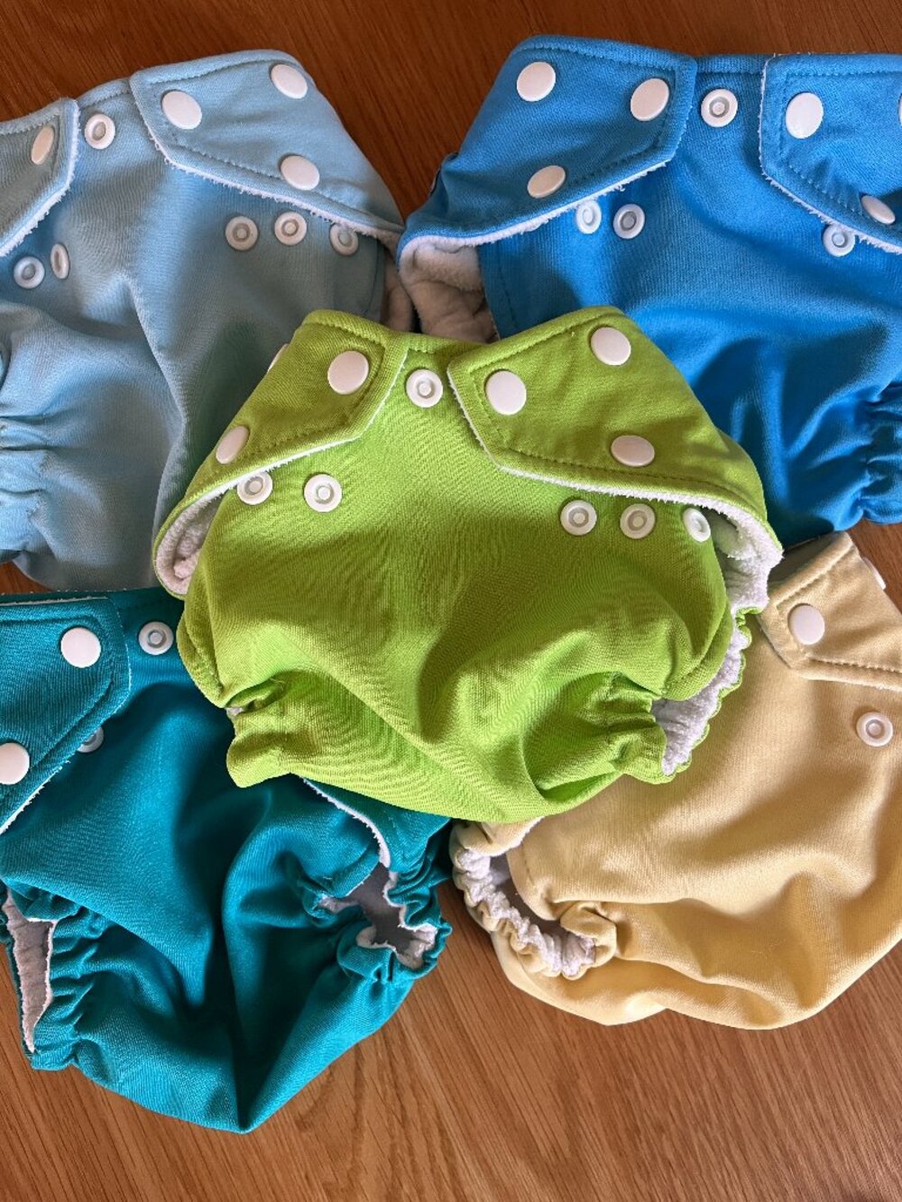 5 Fuzzibunz pocket diapers with inserts and extra elastic